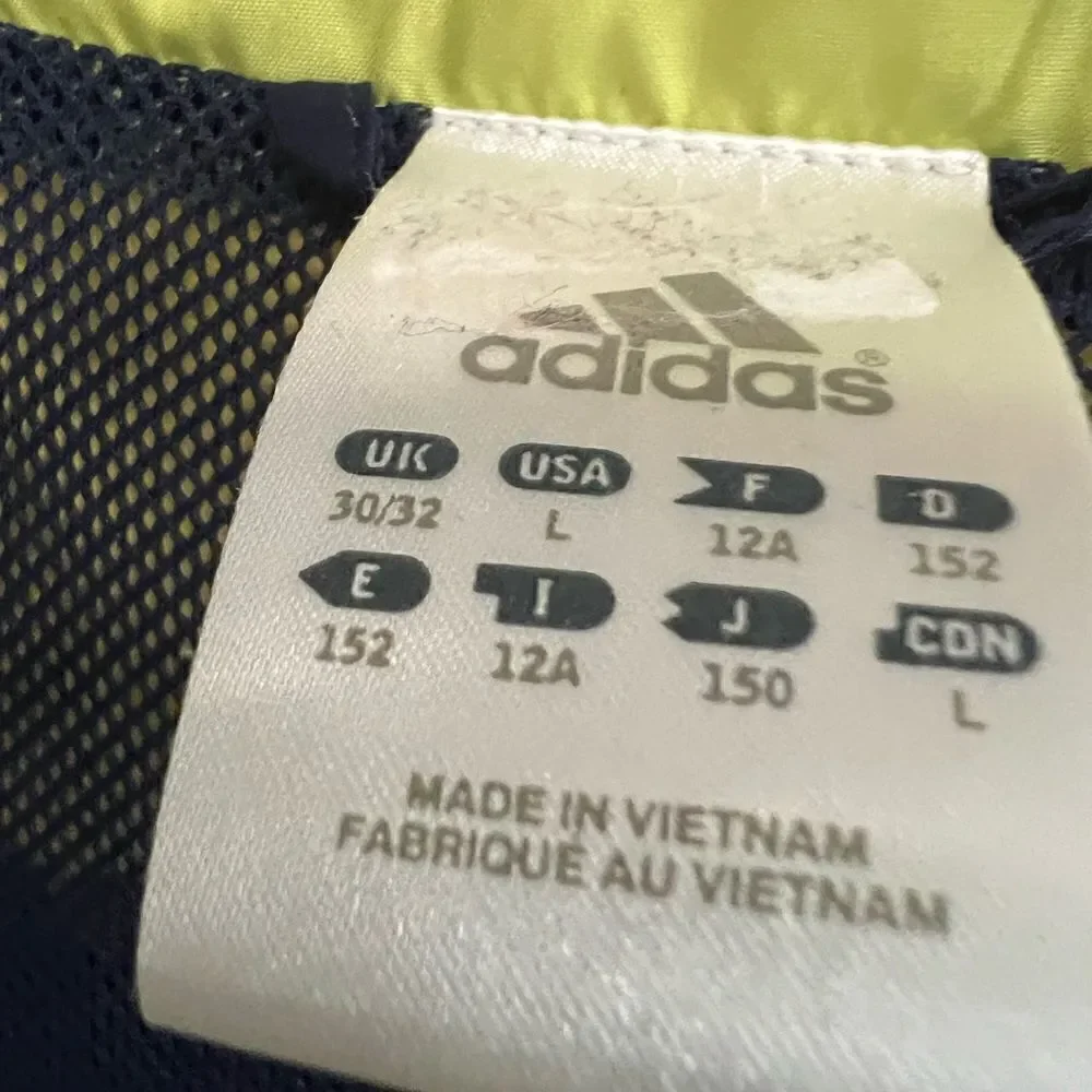 Vintage Adidas youth large navy and light green zip up jacket